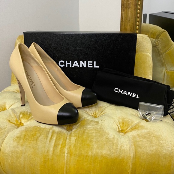 CHANEL Shoes - Authentic Chanel beige and black cap toe pumps